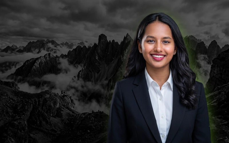 Keerthana V smiling against alpine peaks